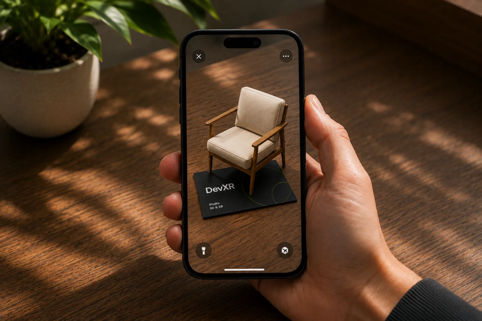 Fauteuil en 3D affiché en réalité augmentée au-dessus de la carte
